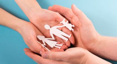 people-holding-hands-cute-paper-family_23-2148485839